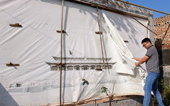 党建文化墙焕新颜 绘就王窑村新画卷——洛阳市考古研究院驻村工作队助力王窑村文化阵地提质升级纪实